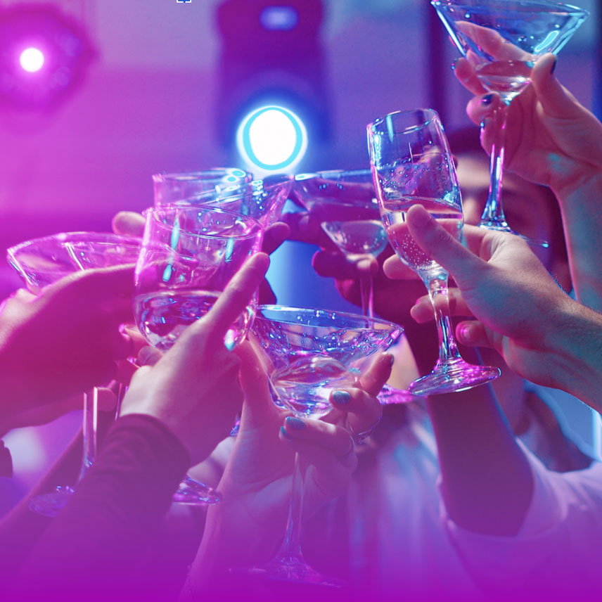 Drink glasses in the air toasting